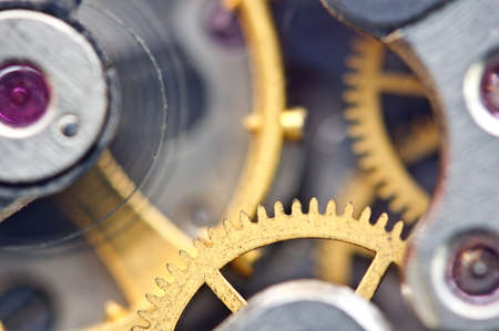 Macro, background with metal cogwheels a clockwork. Conceptual photo for your successful business...