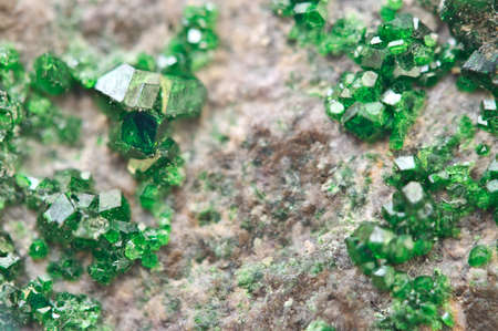 Uvarovite is a chromium-bearing garnet group species with the formula: Ca3Cr2(SiO4)3. Macro....