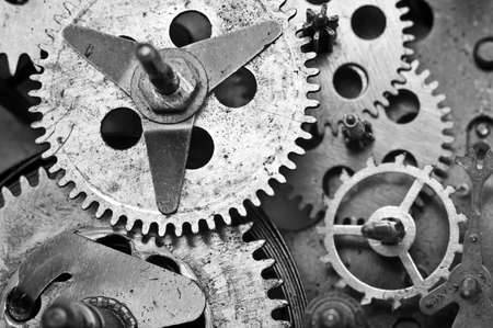 Black white Metal Cogwheels Inside Old Clockwork to success concept for your technology design. Macroの写真素材