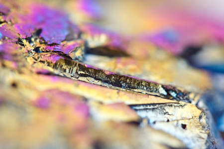 Fantastic multi-coloured background from thin layer of the titan on a quartz surface Macro, for successful business projects and other Your variantの写真素材