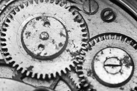Black and white macro photo close-up view of metal clockwork. Concept eternity, teamworkの写真素材