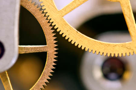 Metal cogwheels inside clockwork. Concept Eternity, Teamwork , Idea Technology. Macro
