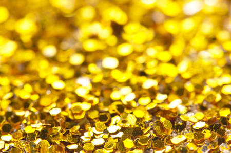 Colorful twinkling lights bokeh light golden Christmas backgroundの写真素材