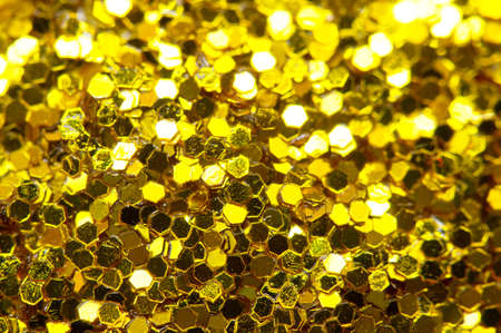 Festive brilliant christmas background golden of sparkles.