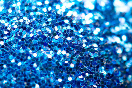 Festive brilliant christmas background blue of sparkles.