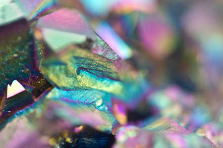 Beautiful colorful background of thin layer of titanium on the surface of quartz. Macro.の写真素材