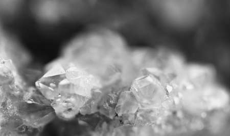 Black and white photograph of the structure of the surface of crystals. Close-up. Blurred backgroundの写真素材