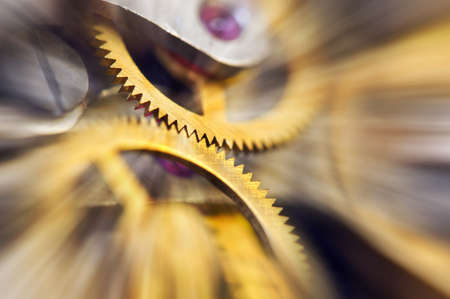 Metal Cogwheels in clock mechanism , abstract sun beams, Concept Movement is life, Teamwork , Idea Technology, Infinity. Macro.の写真素材
