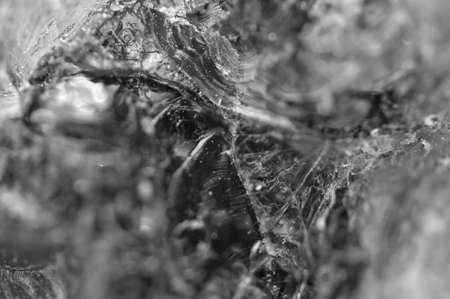 Black and white photo, texture from natural crystal. Macro. Abstract background.