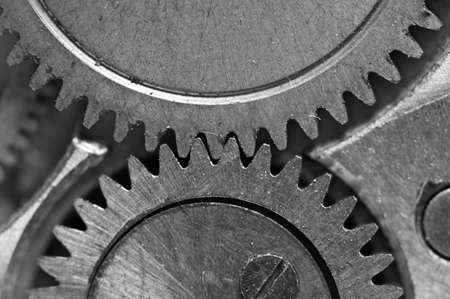 Concept Teamwork or successful business design. Black and white photo background  of old metal gears or parts. Macroの写真素材