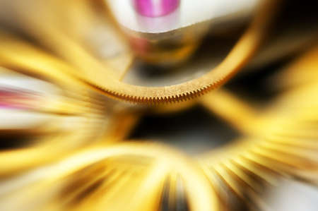 Metal Cogwheels in mechanism , abstract sun beams, Concept Movement is life, Teamwork , Idea...