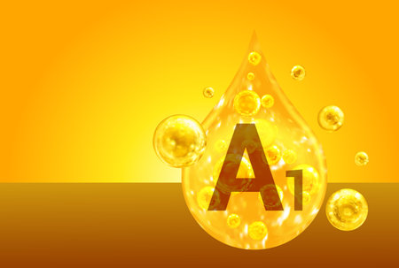 Vitamin A1. Golden drops with oxygen bubbles. health concept.の写真素材