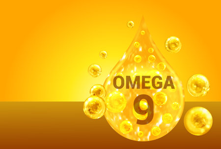 Omega 9. Golden drops with oxygen bubbles. health conceptの写真素材
