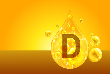 Vitamin D. Golden drops with oxygen bubbles. health conceptの写真素材