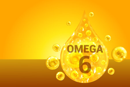 Omega 6. Golden drops with oxygen bubbles. health conceptの写真素材