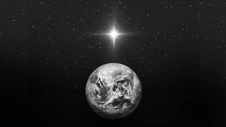 Bright star over planet earth. Christmas star of the Nativity of Bethlehem, Nativity of Jesus Christ. black and white.の写真素材