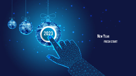 startup concept. New Year fresh start. 2023 on the button. polygonal hand. Clicking. Polygonal Christmas balls. Background of the blue starry sky.のイラスト素材