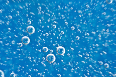 water. Movement of air bubbles blue beautiful abstract underwater backgroundの写真素材