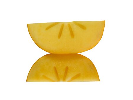 persimmon fruit and sliced persimmon close-up on a white backgroundの写真素材