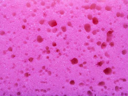 Creative idea for background. pink porous spongeの写真素材