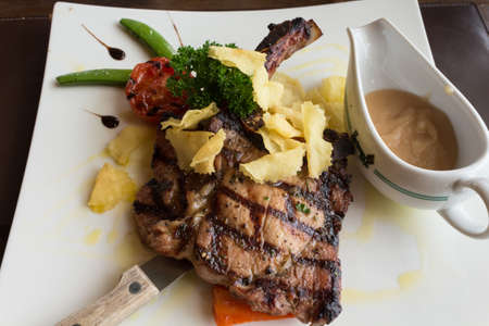 Grilled steaks and vegetables ( pork )の写真素材