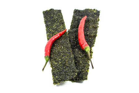 seaweed sheets and chilli isolated on a white backgroundの写真素材