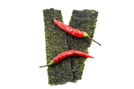 seaweed sheets and chilli isolated on a white backgroundの写真素材
