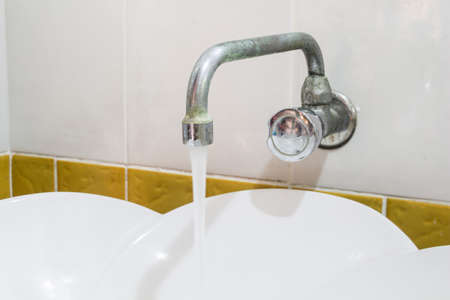 Water drop from faucet