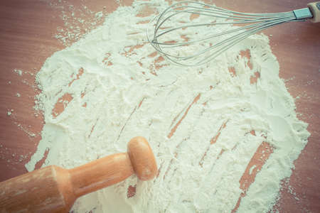 baking cake with egg background -vintage retro style color effectの写真素材