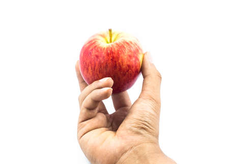 hand with red apple isolated on white background
