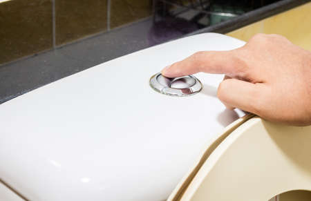Flush cleaning toiletの写真素材
