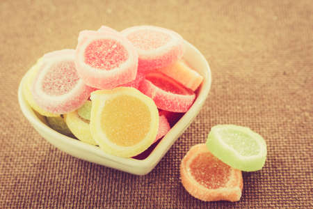 Sweet sugar candies on  wooden backgroundの写真素材