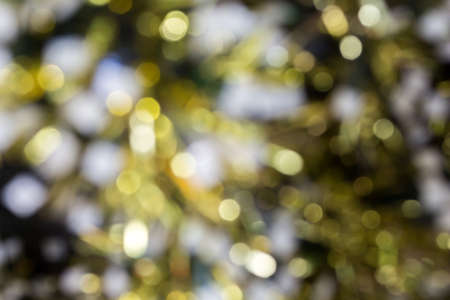 Abstract background with bokeh defocused lightsの写真素材