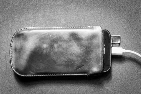 Smartphone with chargerの写真素材