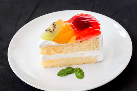 Fruit cake on plateの写真素材