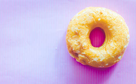 Delicious donuts on a pink backgroundの写真素材