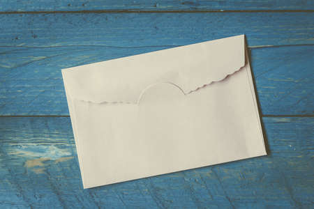 A envelope on wooden backgroundの写真素材