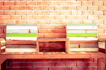 Chair on brick wall backgroundの写真素材