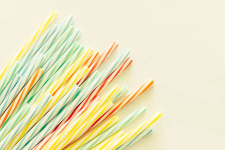 Striped drink straws of different colorsの写真素材