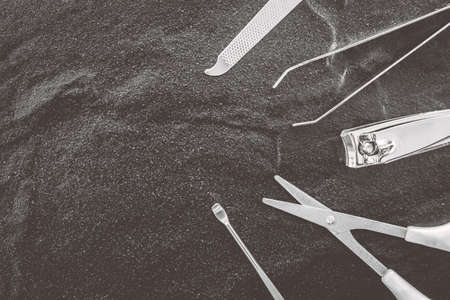 Tools of a manicure set  on black backgroundの写真素材