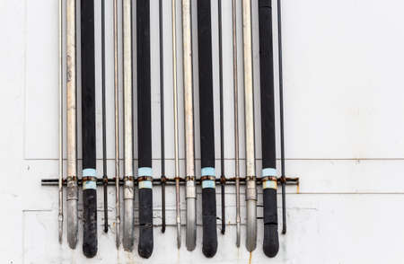 Pipeline water detail at industrial building wallの写真素材