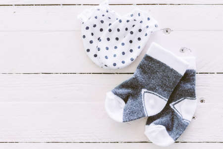 Baby socks on a wooden backgroundの写真素材