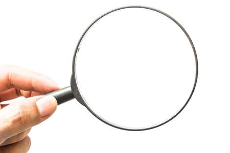 Hand holding magnifying glass isolated on white backgroundの写真素材