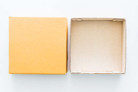 Opened cardboard box on white backgroundの写真素材