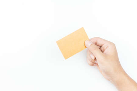 Hand holding paper on white backgroundの写真素材