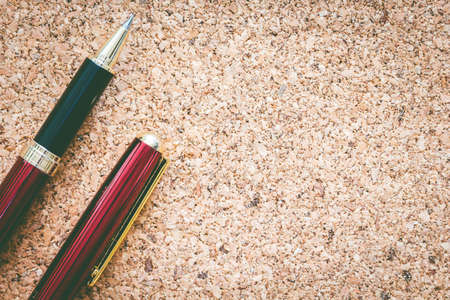 Pen on cork notice boardの写真素材