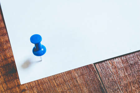 Pin Paper on wooden table for text and background