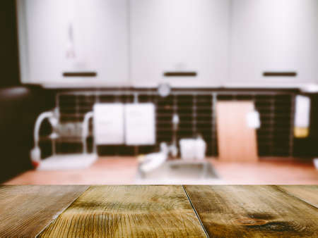 Wood table on blur Interior of kitchen backgroundの写真素材