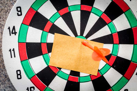 Blank  paper at the center of dart aim