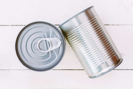 Aluminum can on wooden background